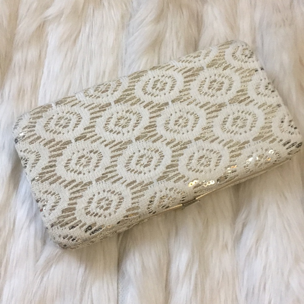 White and gold clutch wallet